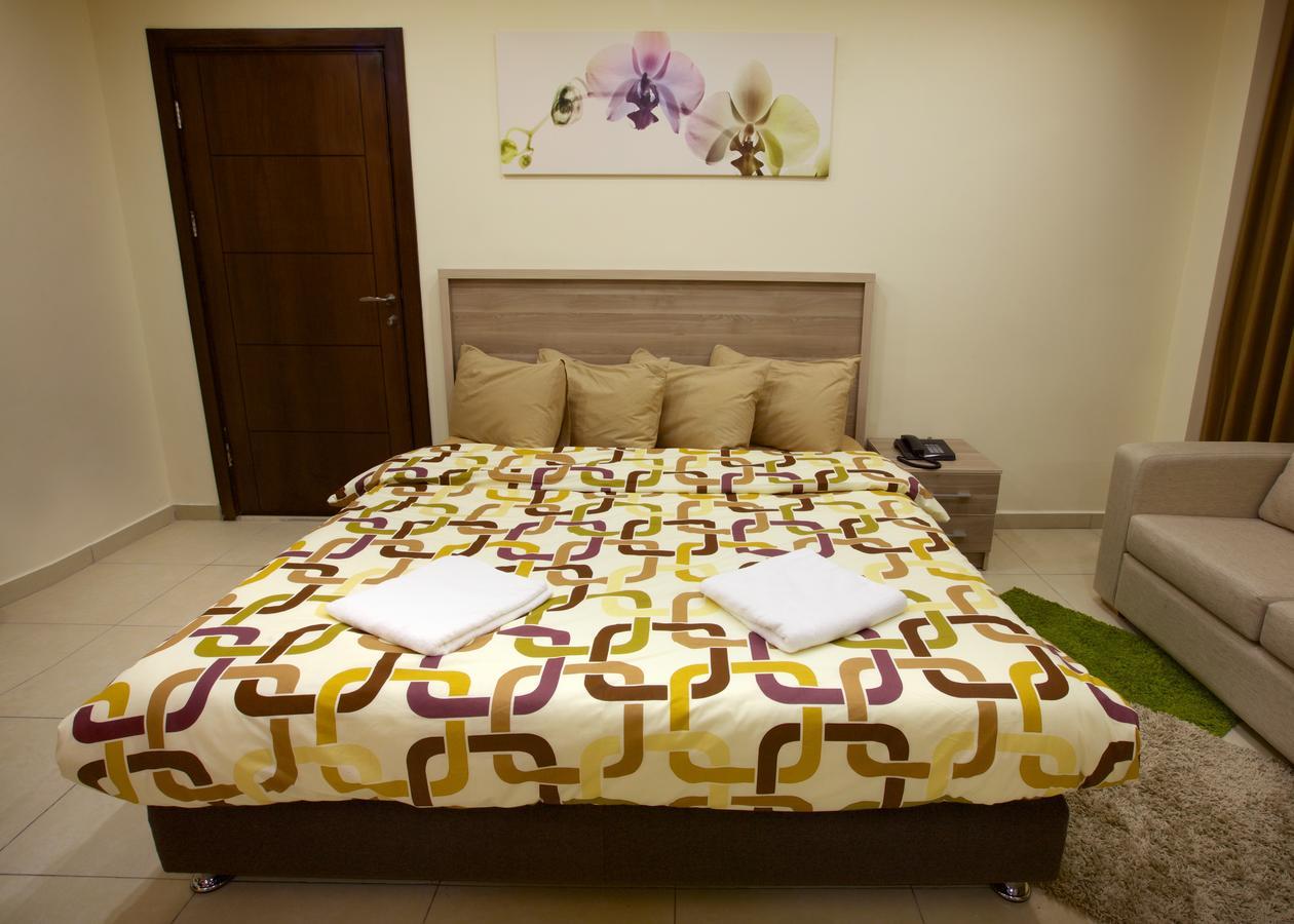 Lujain Hotel فندق النور واللجين Amán Habitación foto