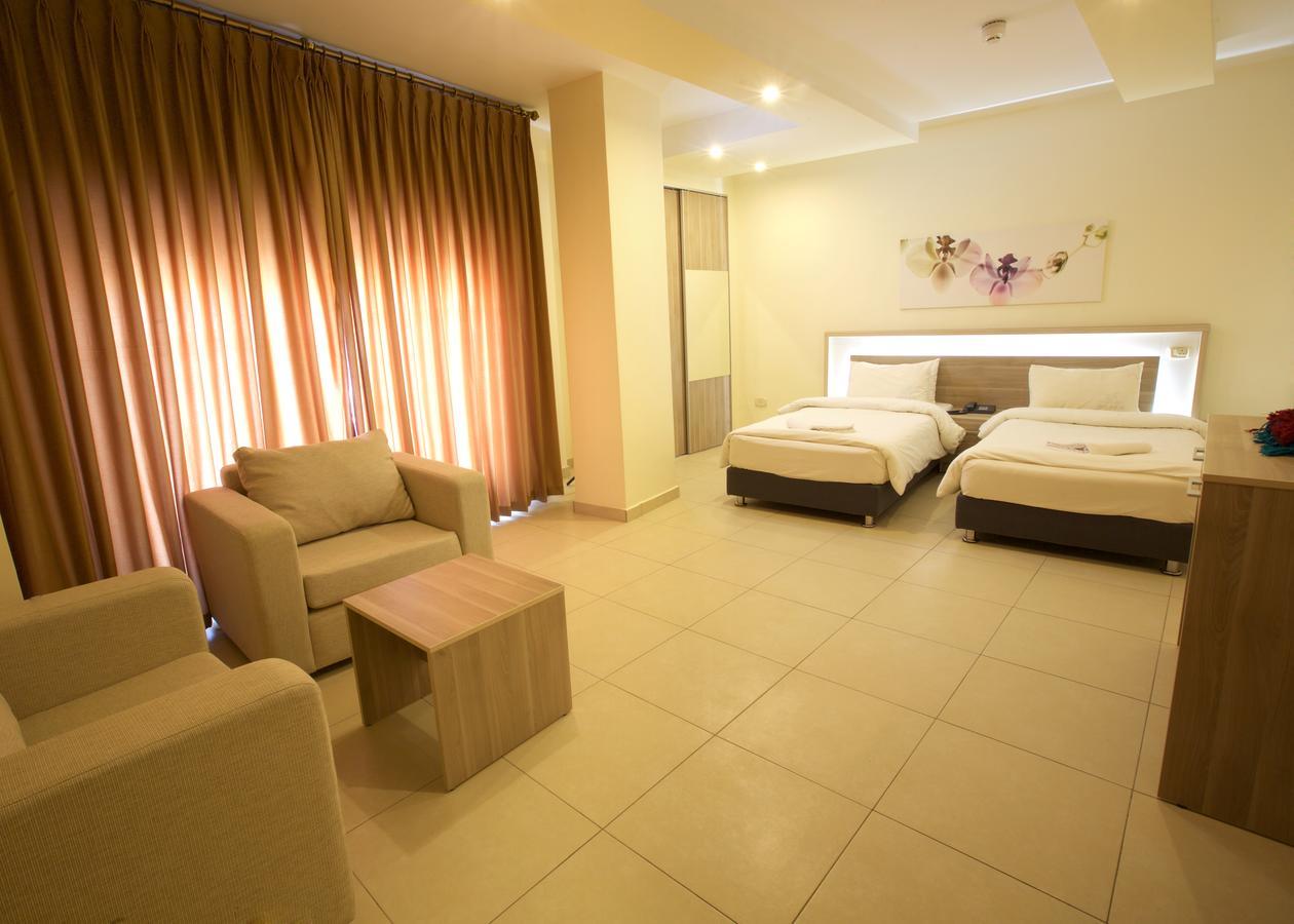 Lujain Hotel فندق النور واللجين Amán Habitación foto